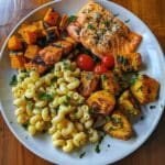Family-friendly gluten free meal with mac and cheese, salmon, and sides