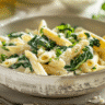 Creamy spinach ricotta pasta served in a bowl