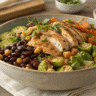 Rustic dense bean salad with chicken and Brussels sprouts in a bowl