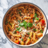 One-pot gluten-free pasta in white Dutch oven ,One-Pot Gluten-Free Pasta Recipes for Busy Families