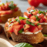 Gluten-free bruschetta appetizer on rustic wooden board