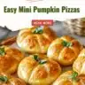 Easy mini pumpkin pizzas topped with cheese and herbs on a baking sheet.