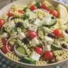 Healthy Greek Pasta Salad with fresh vegetables and feta cheese