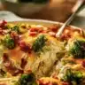 Creamy low carb chicken casserole served in a baking dish