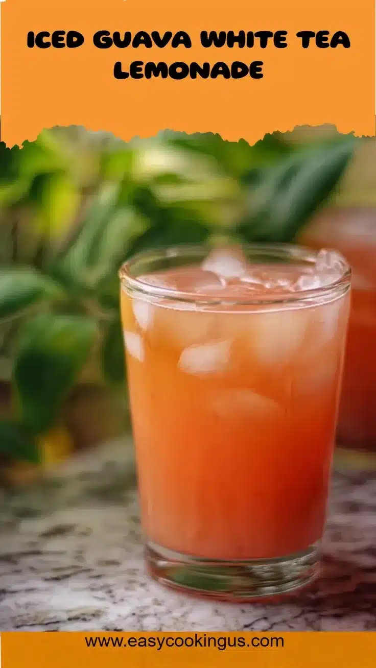 Refreshing Iced Guava White Tea Lemonade in a glass with lemon slices