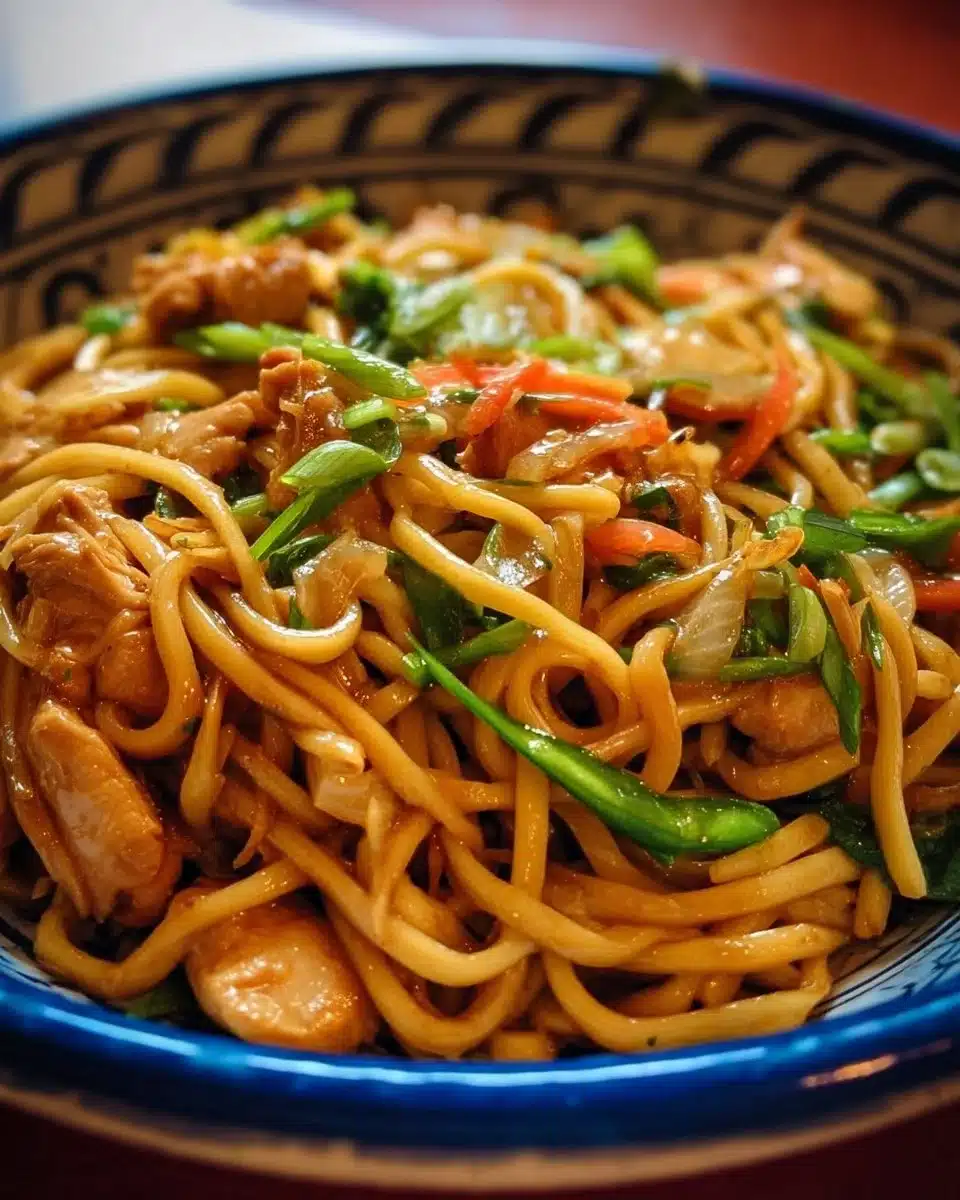 Delicious Chicken Lo Mein served in a bowl with vibrant vegetables and noodles