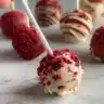 Delicious Red Velvet Cake Pops arranged on a platter for dessert.