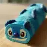 Stitch-Inspired Tropical Blue Cake Roll decorated with vibrant colors and tropical themes