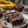 Delicious fudgy banana brownies topped with chocolate glaze.