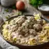 Delicious Meatball Stroganoff served on a plate with creamy sauce and noodles