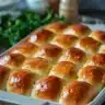 Golden brown retro hot yeast rolls served fresh from the oven.