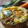 A comforting bowl of Shepherd's Pie Soup, showcasing rich ingredients and savory flavors.