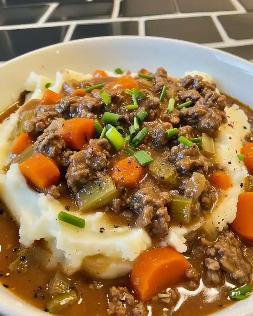 Delicious homemade Cottage Pie served in a rustic bowl.