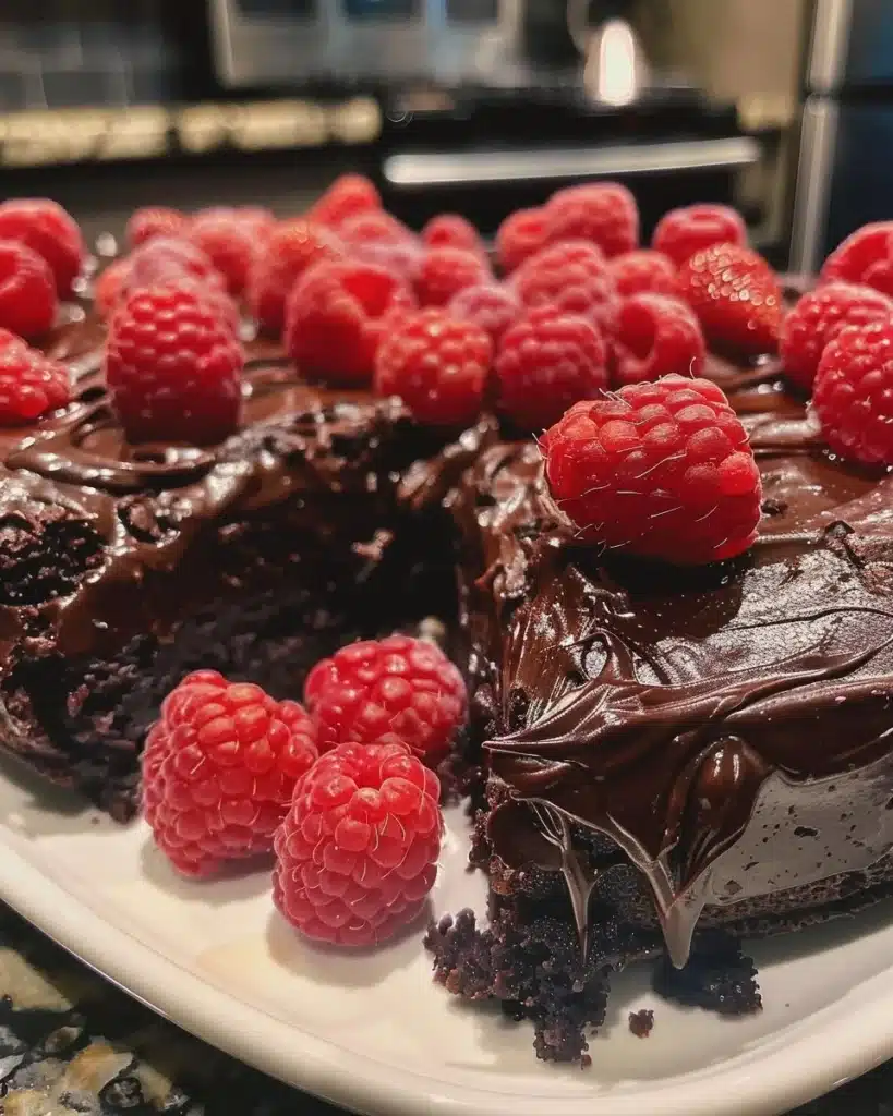 Delicious Raspberry Cheesecake Brownies with creamy cheesecake and raspberry swirl