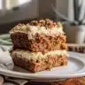Deliciously moist Carrot Coffee Cake topped with cream cheese frosting