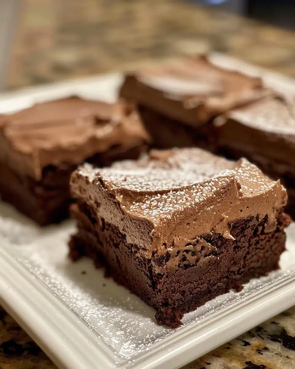 Delicious Chocolate Mousse Chiffon Cake topped with chocolate shavings.
