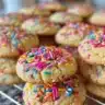 Baked Funfetti Sugar Cookies topped with vibrant sprinkles