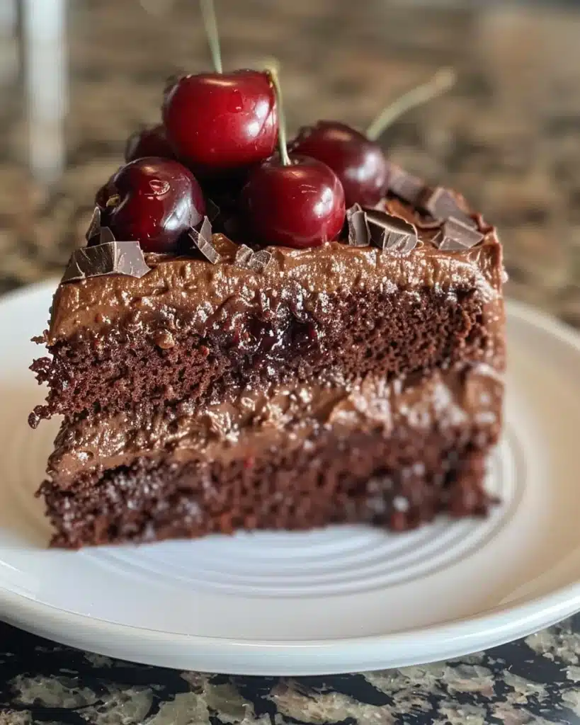 Delicious Black Forest Cupcakes with chocolate, cherry, and whipped cream topping