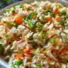 Delicious plate of everyday veggie fried rice with colorful vegetables.