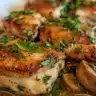 Delicious Garlic Mushroom Chicken dish garnished with herbs