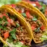 Delicious ground turkey tacos garnished with fresh toppings