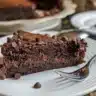 Delicious homemade chocolate cake topped with chocolate frosting