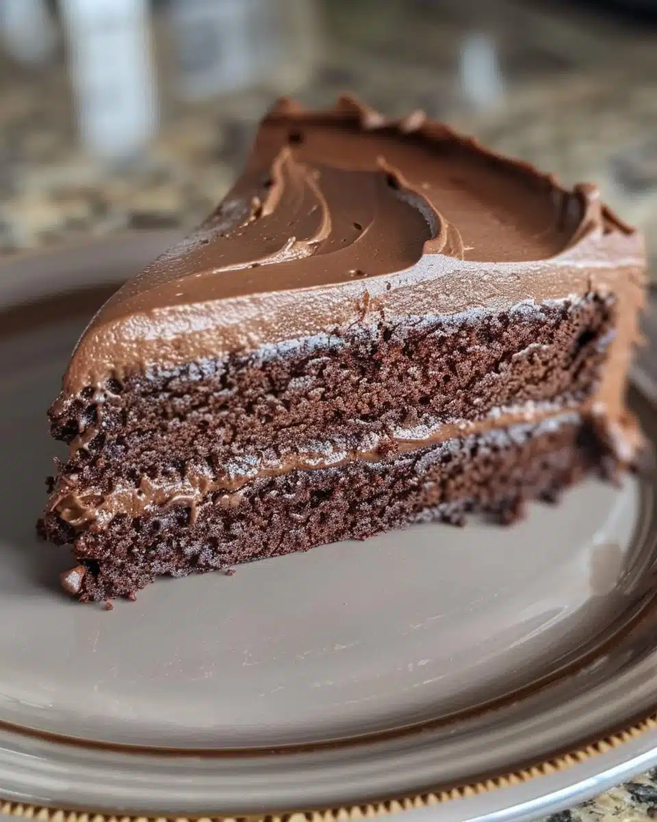 Delicious Matilda Chocolate Cake topped with chocolate ganache and sprinkles