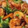 Colorful shrimp stir fry with vegetables in a wok