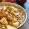 Apple Cinnamon Baked Oatmeal Cups served on a wooden table