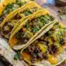 Delicious Blackstone cheeseburger quesadilla with melted cheese and toppings