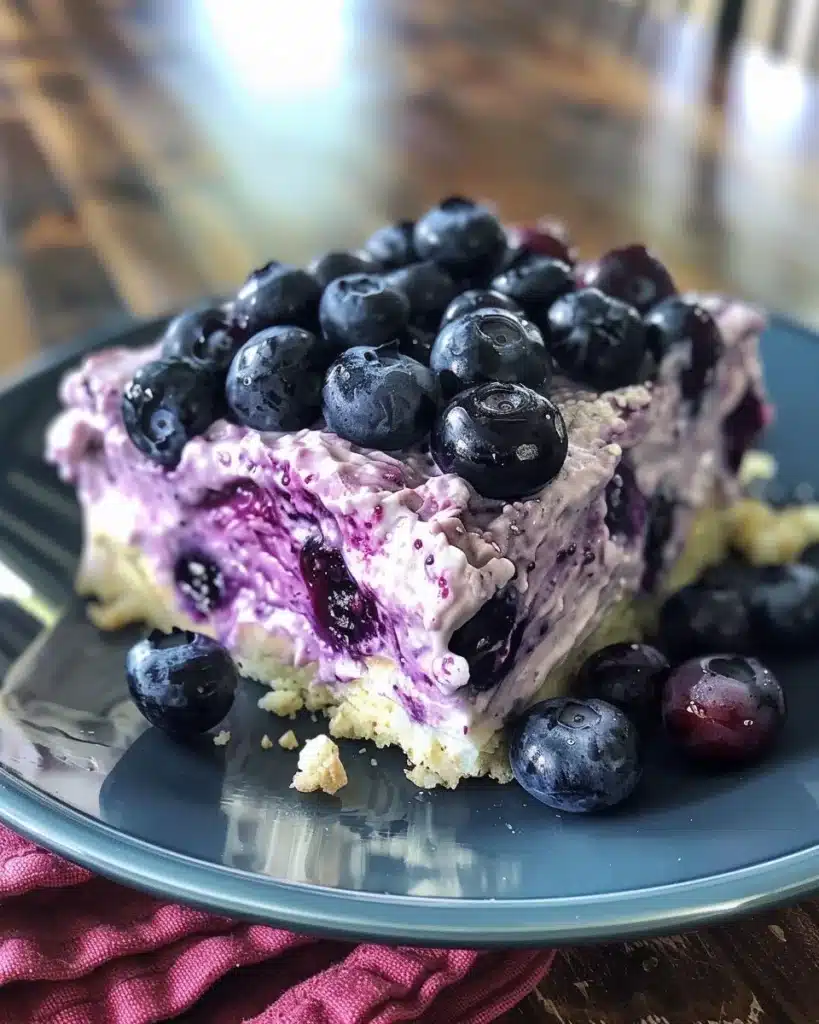 Freshly baked blueberry muffins with vibrant blueberries on top