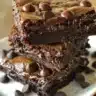 Delicious brownie dessert assortment with various toppings and flavors.