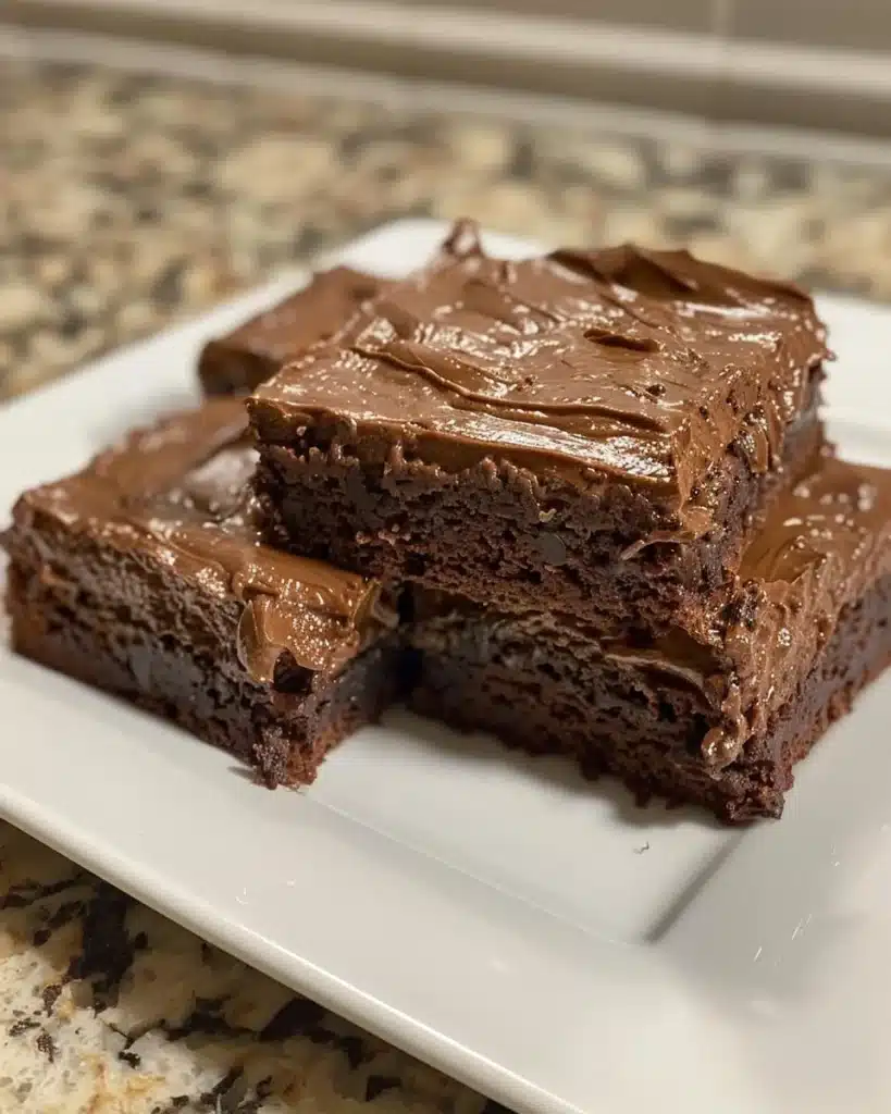 Delicious molten cupcakes filled with chocolate chip cookie dough
