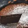 Delicious homemade Chocolate Crinkle Cookies dusted with powdered sugar.