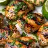 Delicious cilantro lime chicken garnished with fresh herbs and lime slices