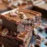 Delicious homemade cocoa powder brownies on a wooden table