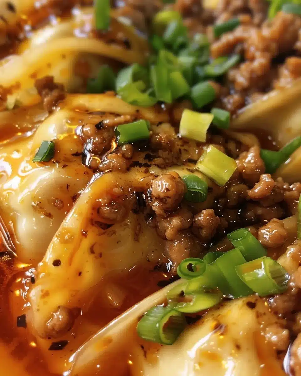Plate of crispy beef and sausage wontons served with dipping sauce