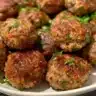 Easy air fryer meatloaf served with sides on a plate