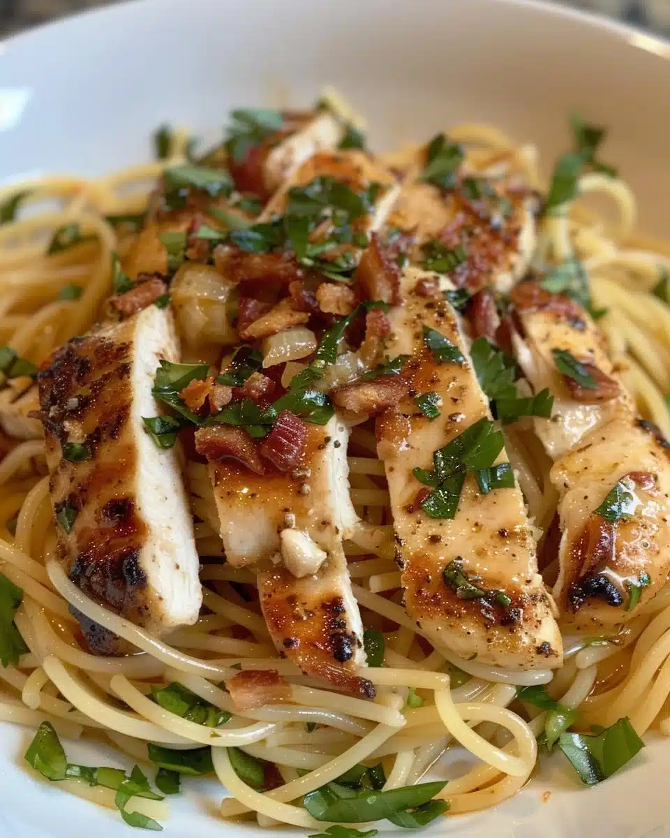 Garlic Parmesan Chicken Spaghetti in spicy Cajun cream sauce served in a bowl