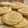 Delicious homemade lemon ginger cookies on a wooden table