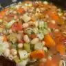 Bowl of homemade minestrone soup with vegetables and pasta