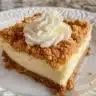 Delicious mini key lime cheesecakes served on a platter with lime wedges.
