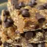 No bake peanut butter chocolate bars topped with chocolate and peanut butter drizzle