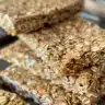 Loaf of homemade no-knead honey oat bread with golden crust
