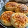 Freshly baked no-knead jalapeño cheddar bread with a golden crust.