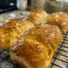Freshly baked overnight rustic white bread on a wooden table