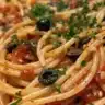 Elegant pasta dish styled in a provocative and alluring manner.