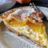 Delicious Peaches and Cream Cake with fresh peach slices and creamy frosting