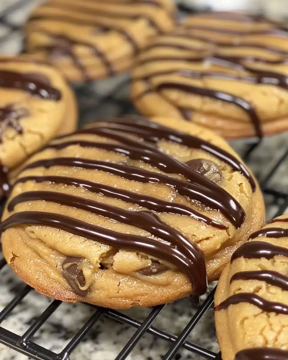 Freshly baked peanut butter cookies on a cooling rack