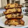 Delicious homemade raisin cake on a plate with a warm background